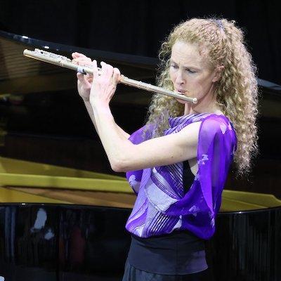 Bridget Douglas playing her flute