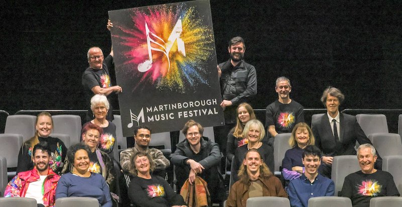 The 2022 musicians and crew in Festival t-shirts