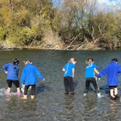 School children paddling in the Ruamahanga River