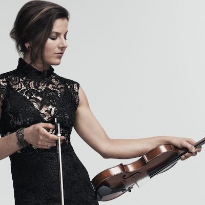 Zoe Black holding her violin