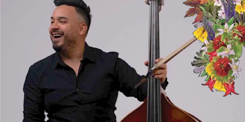 Oscar Luque holding his double bass