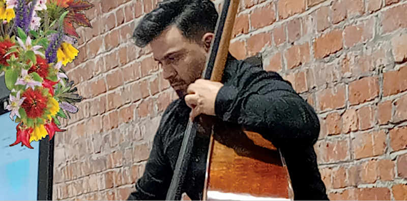 Oscar Luque playing his double bass at the launch of the 2026 MMF