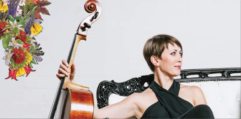 Sharon Grigoryan sitting on a sofa holding her cello